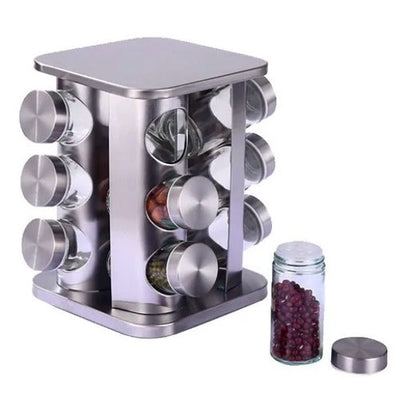 Porta temperos giratório inox com potes de vidro e tampas metálicas, um pote aberto ao lado