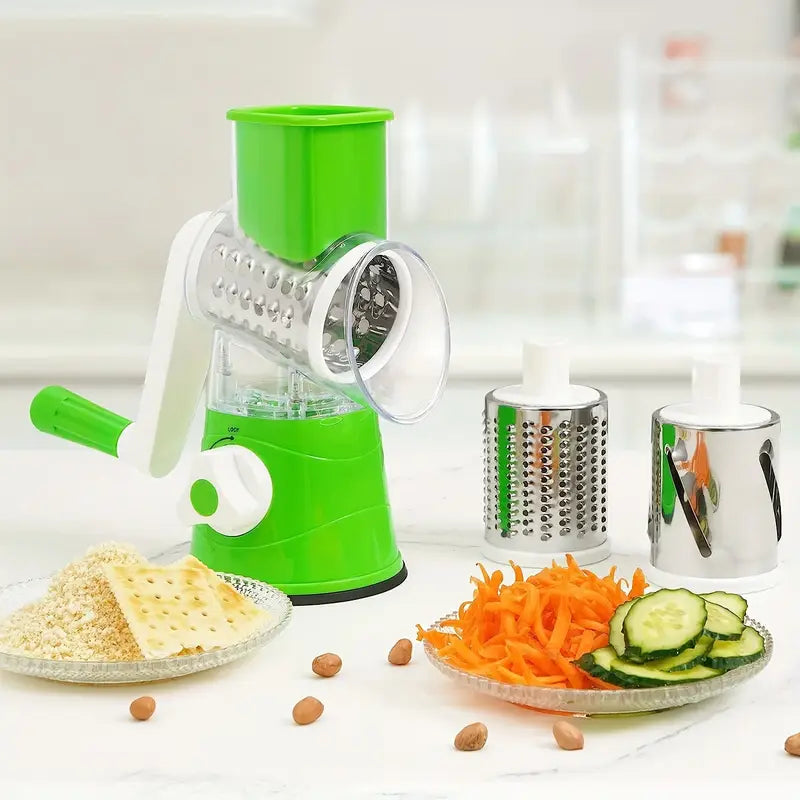Ralador manual verde com três lâminas de aço inox para legumes e queijos, cenoura ralada e fatias de pepino