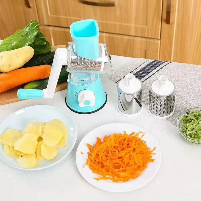 Ralador de legumes multifuncional azul com lâminas intercambiáveis e legumes ralados na cozinha