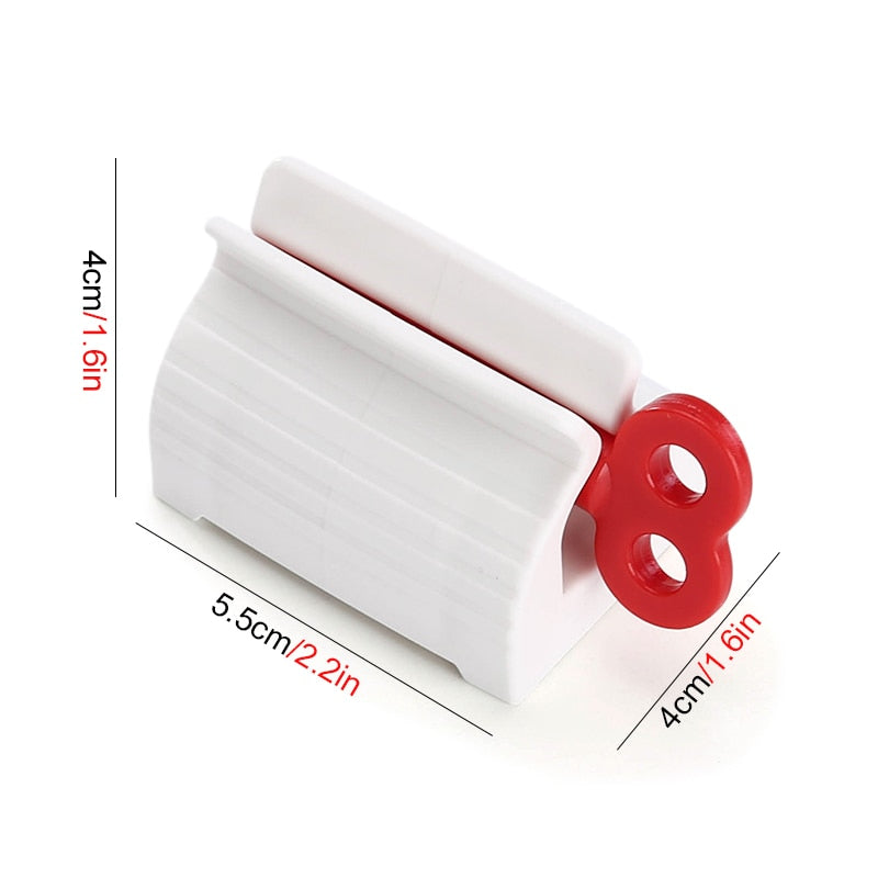 Prendedor de saco plástico branco com detalhe vermelho em forma de vento, com medidas 5,5x4x4 cm