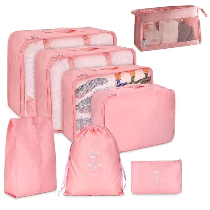 Conjunto de organizadores de viagem rosa com diferentes tamanhos para roupas, sapatos e acessórios