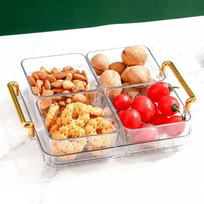 Bandeja multifuncional com potes organizadores transparentes e alças douradas contendo castanhas, nozes, biscoitos e tomates cereja