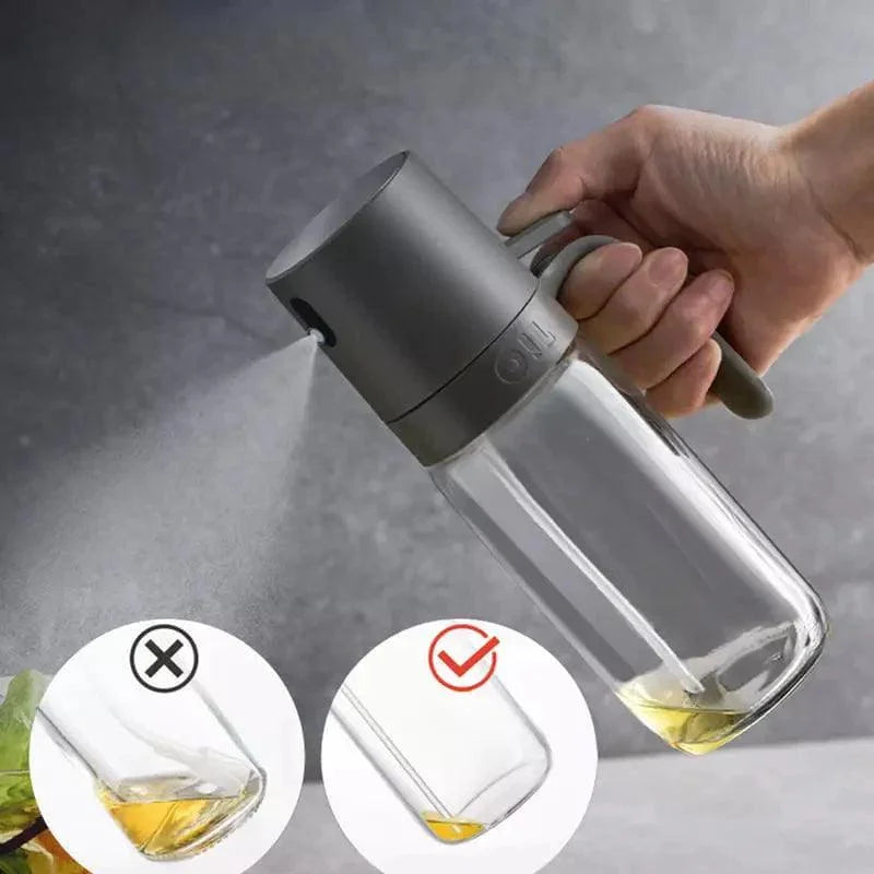 Borrifador de azeite Elegance cinza com pulverizador, vidro transparente e óleo dentro