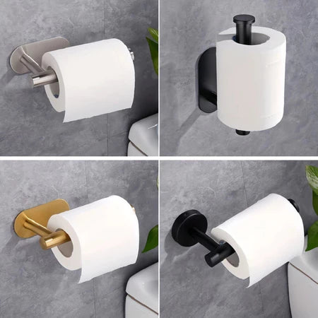 Porta papel higiênico moderno em aço inox, preto fosco e dourado instalado em banheiro com parede cinza