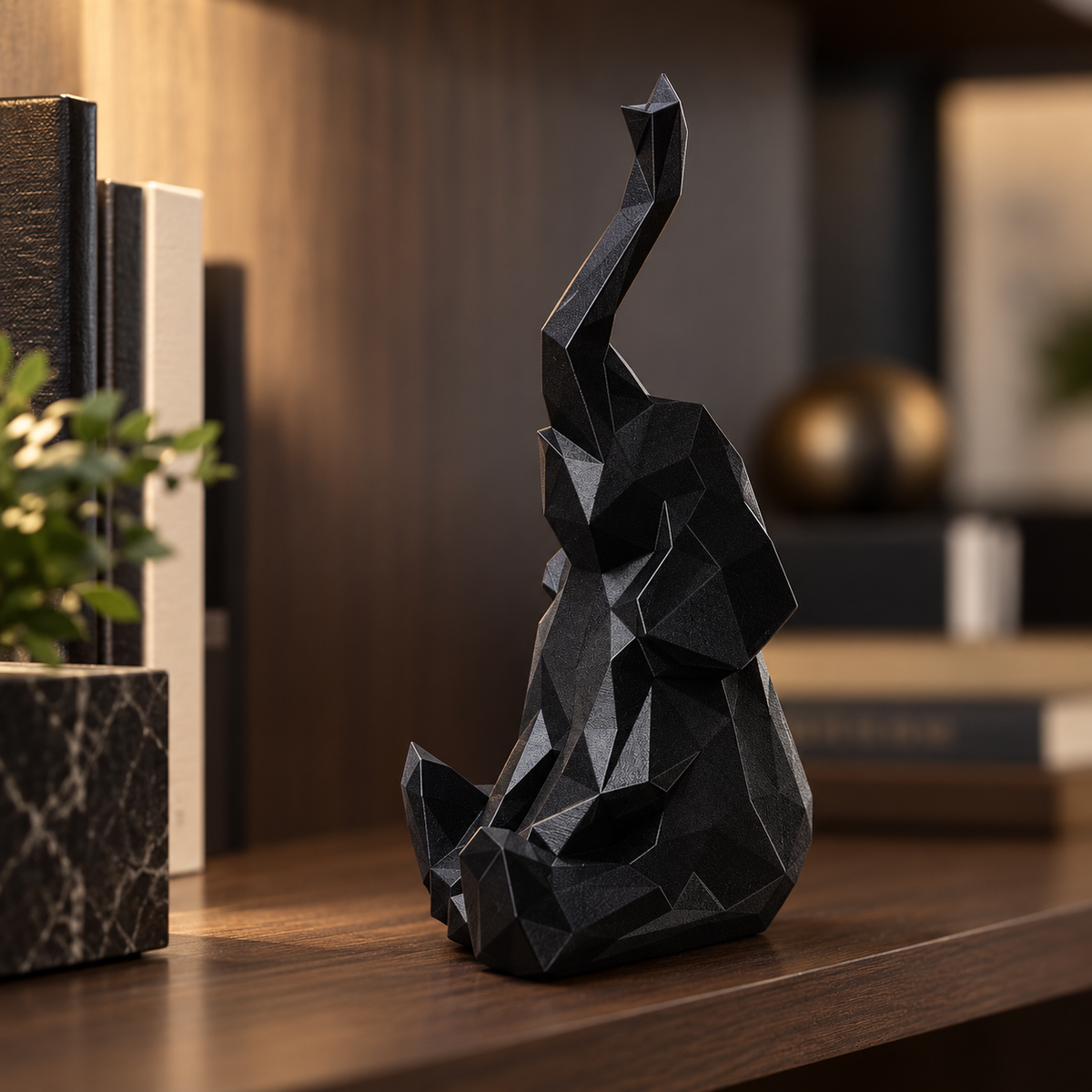 Elefante decorativo minimalista preto em estante