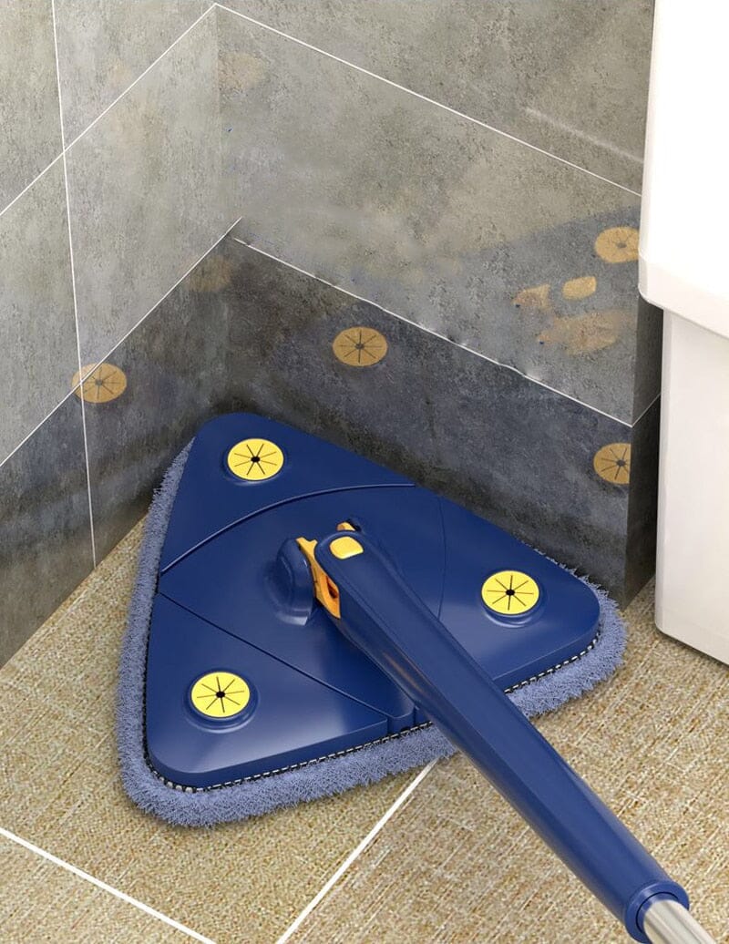 Limpador triangular azul com base de microfibra em canto de piso e parede cinza