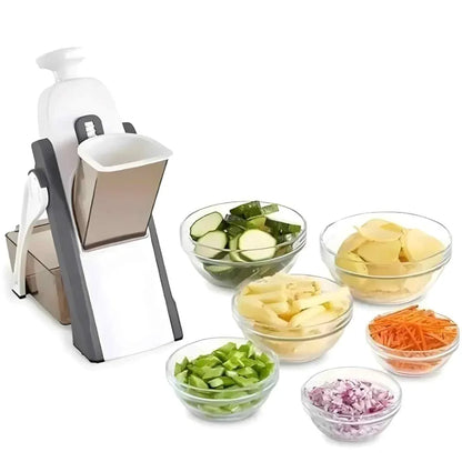 Ralador multiuso branco e cinza com tigelas de vegetais picados incluindo pepino, cenoura, cebola e batata