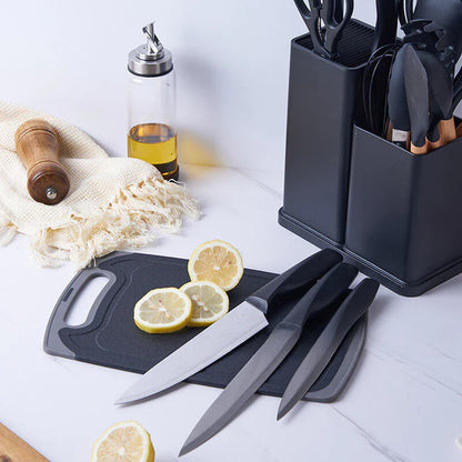 Kit de facas de cozinha com lâminas em aço, tábua preta, limões fatiados, porta-facas e utensílios